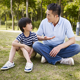 Father and son having a conversation.