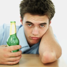 Teen boy that appears to be drunk