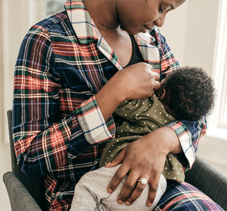 Mother breastfeeding baby