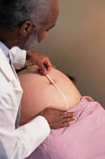 Picture of measurements being taken at a prenatal visit