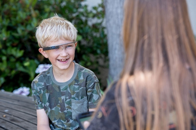Boy wearing Google Glass